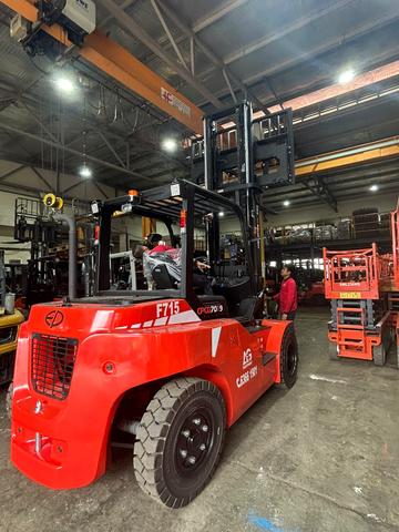 EP forklift on a factory floor with scissor lifts behind, Johor