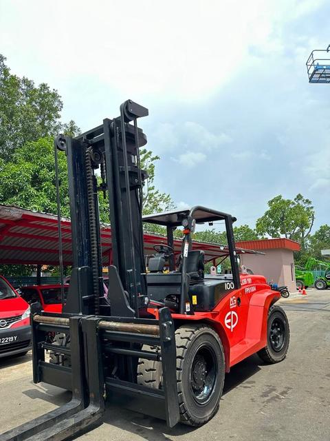 EP forklift parked in a factory bay for servicing by A&G Equipment in Johor