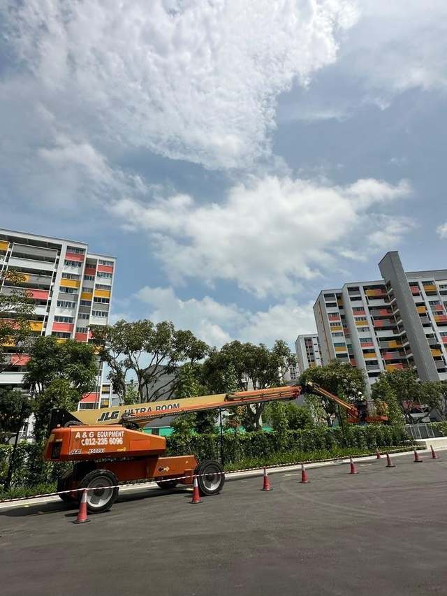 JLG Ultra Boom telescopic boom lift working on a large project site in Johor